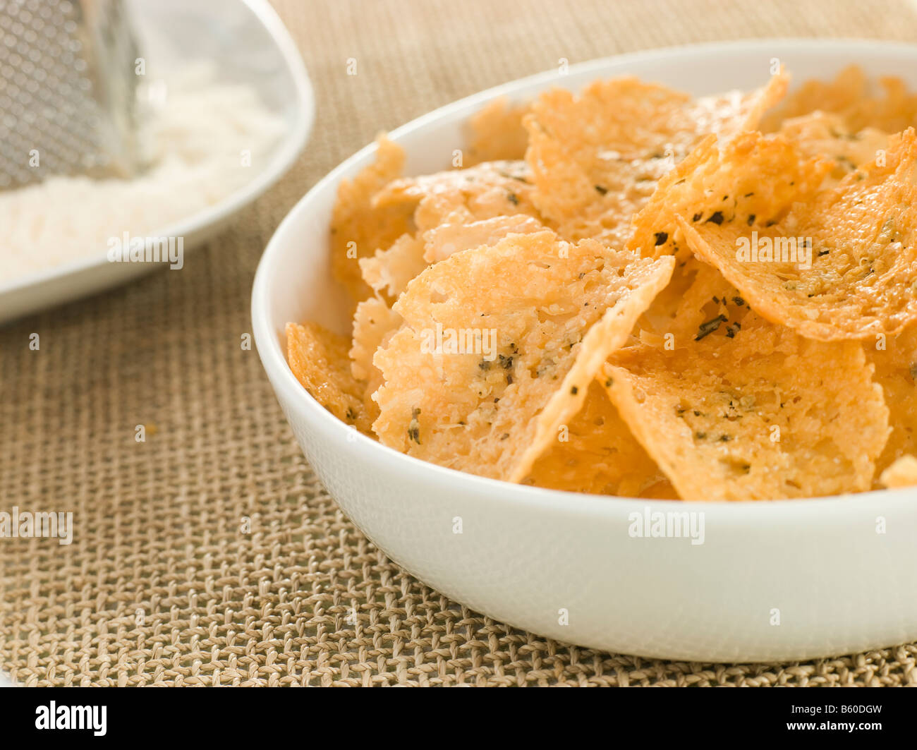 Dish of Parmesan Crisps Stock Photo Alamy