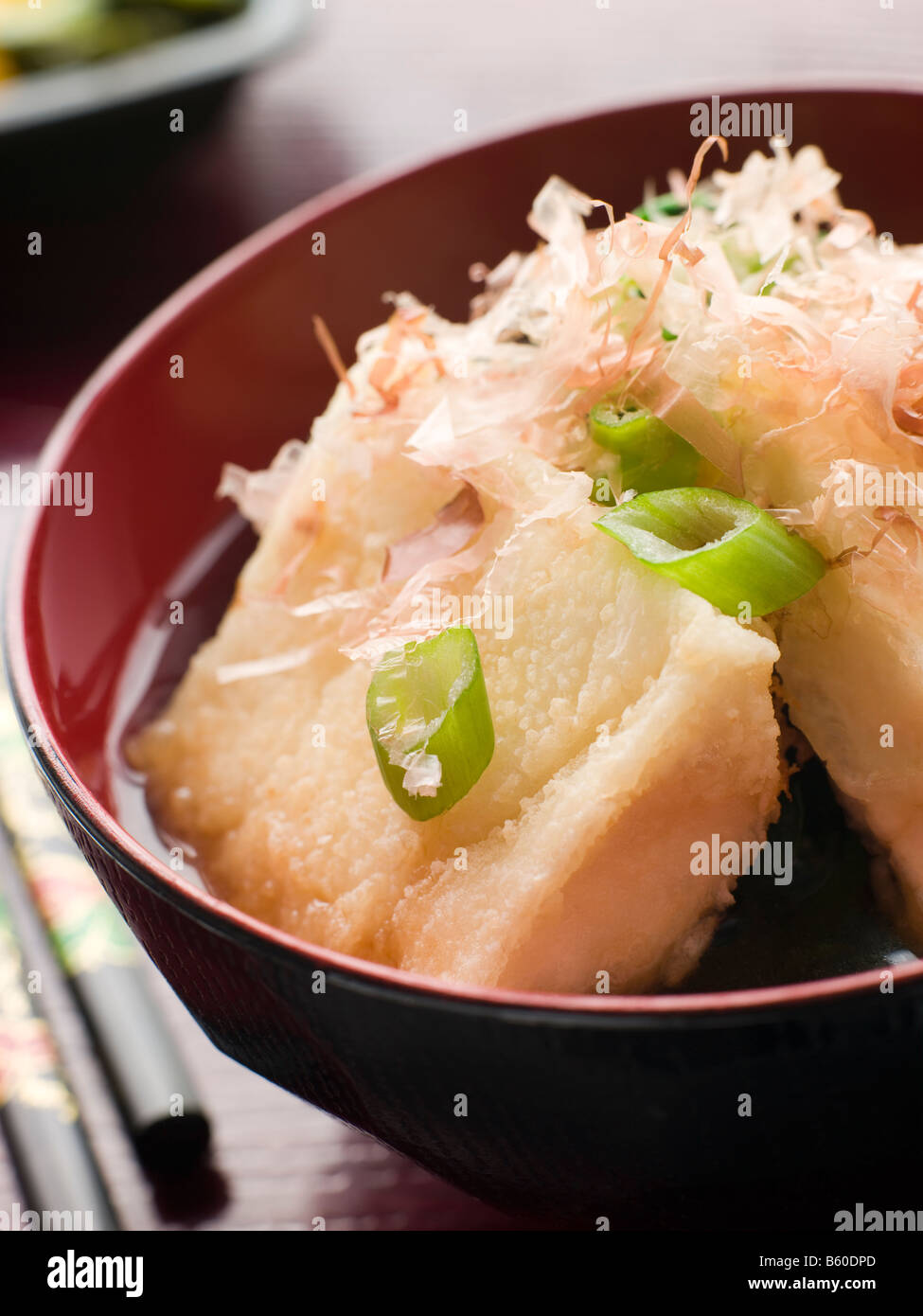 Crisp Fried Tofu in Miso with Bonito Flakes and Pickles Stock Photo
