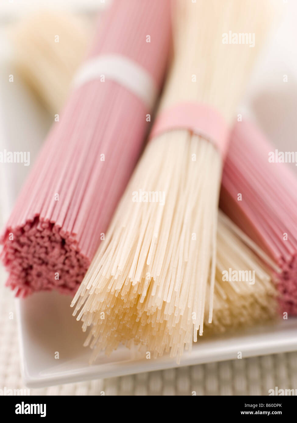 Clear and Pink Dried somen Noodles Stock Photo