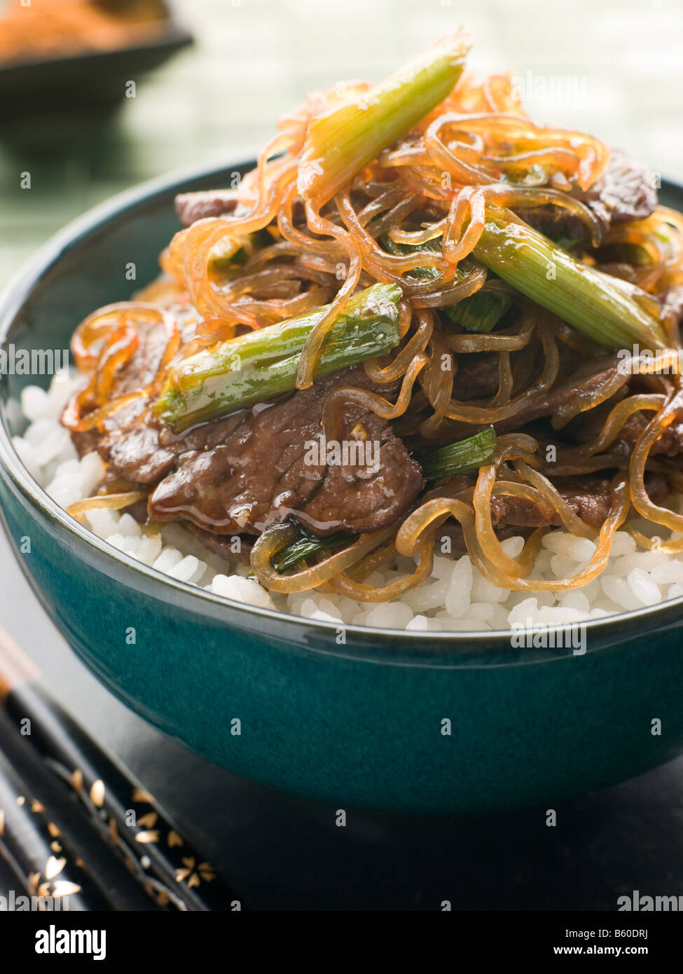 Sweet Soy Beef Fillet with Shirataki Noodles on Rice Stock Photo