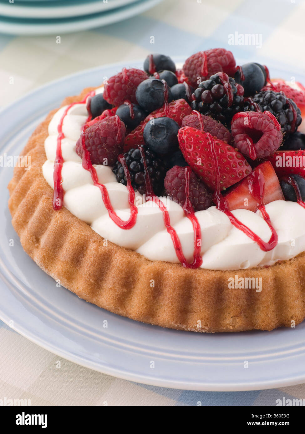 Whipped Cream and Berry Sponge Flan Stock Photo Alamy