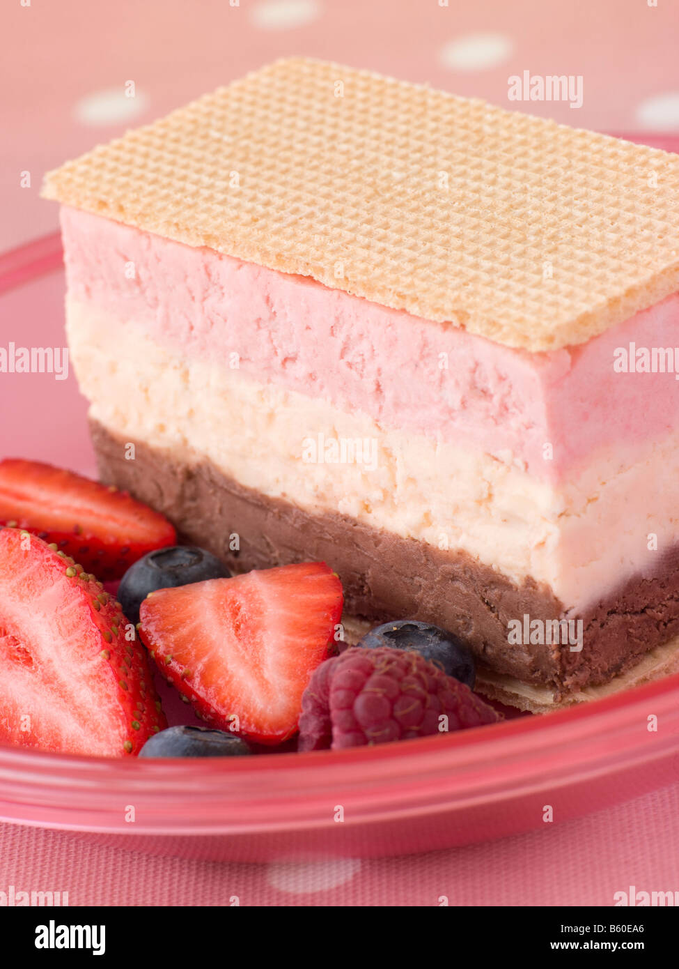 Neapolitan Ice Cream with Wafer Biscuits and Berries Stock Photo Alamy
