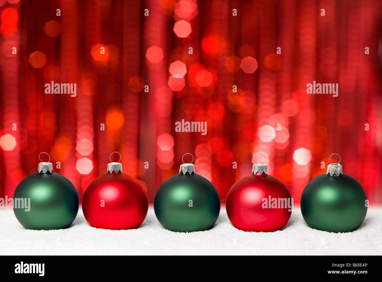 Christmas balls on the snow. Red copy space. aRGB. Stock Photo