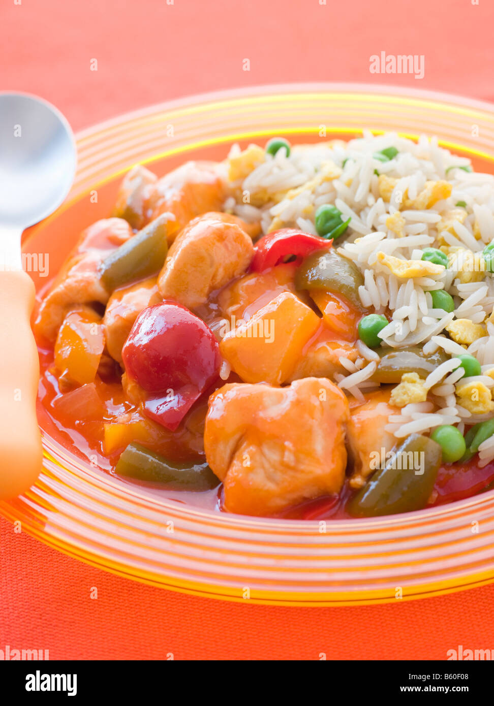 Sweet and Sour Chicken with Egg Fried Rice Stock Photo