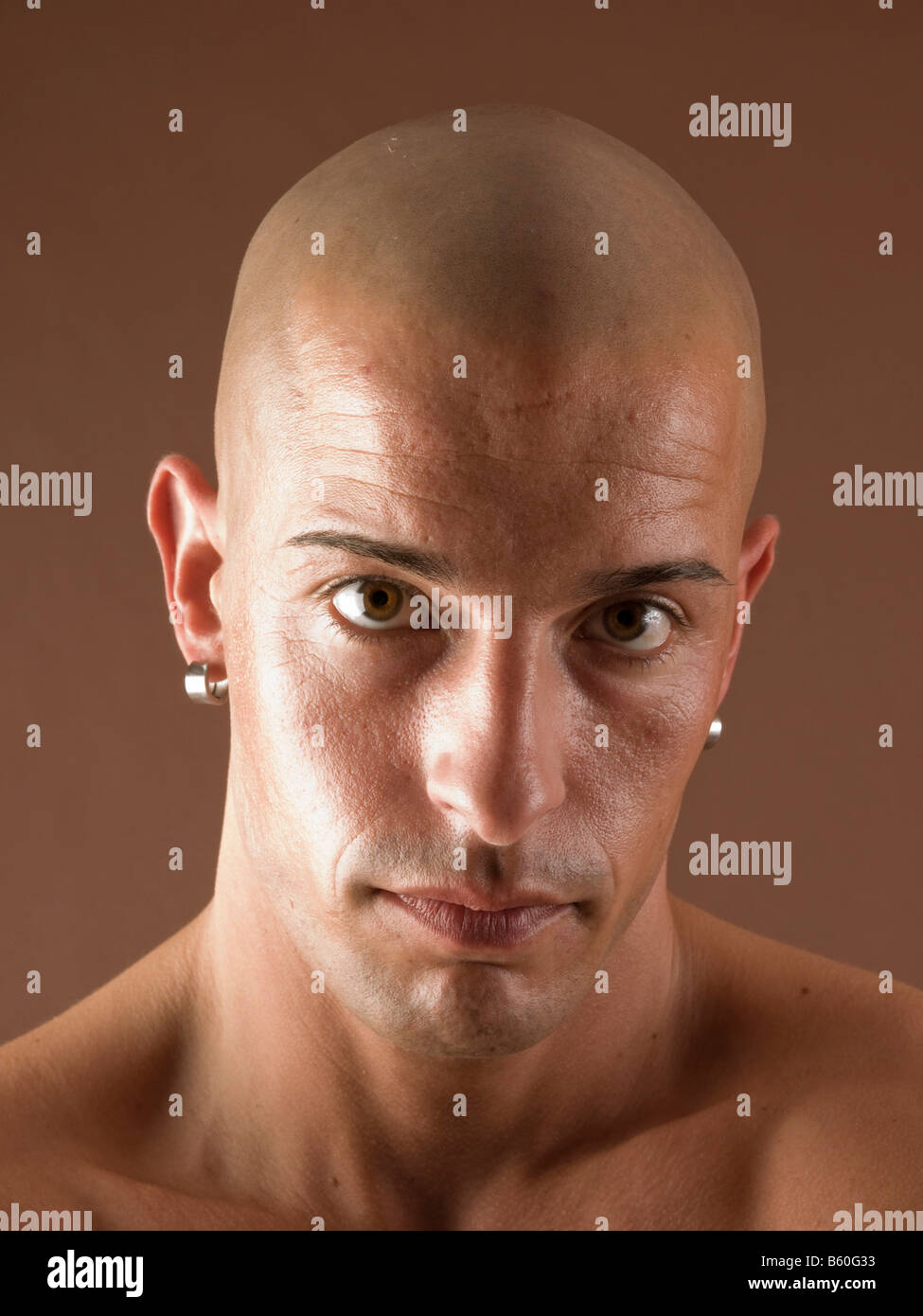 Bald-headed man, face, serious Stock Photo