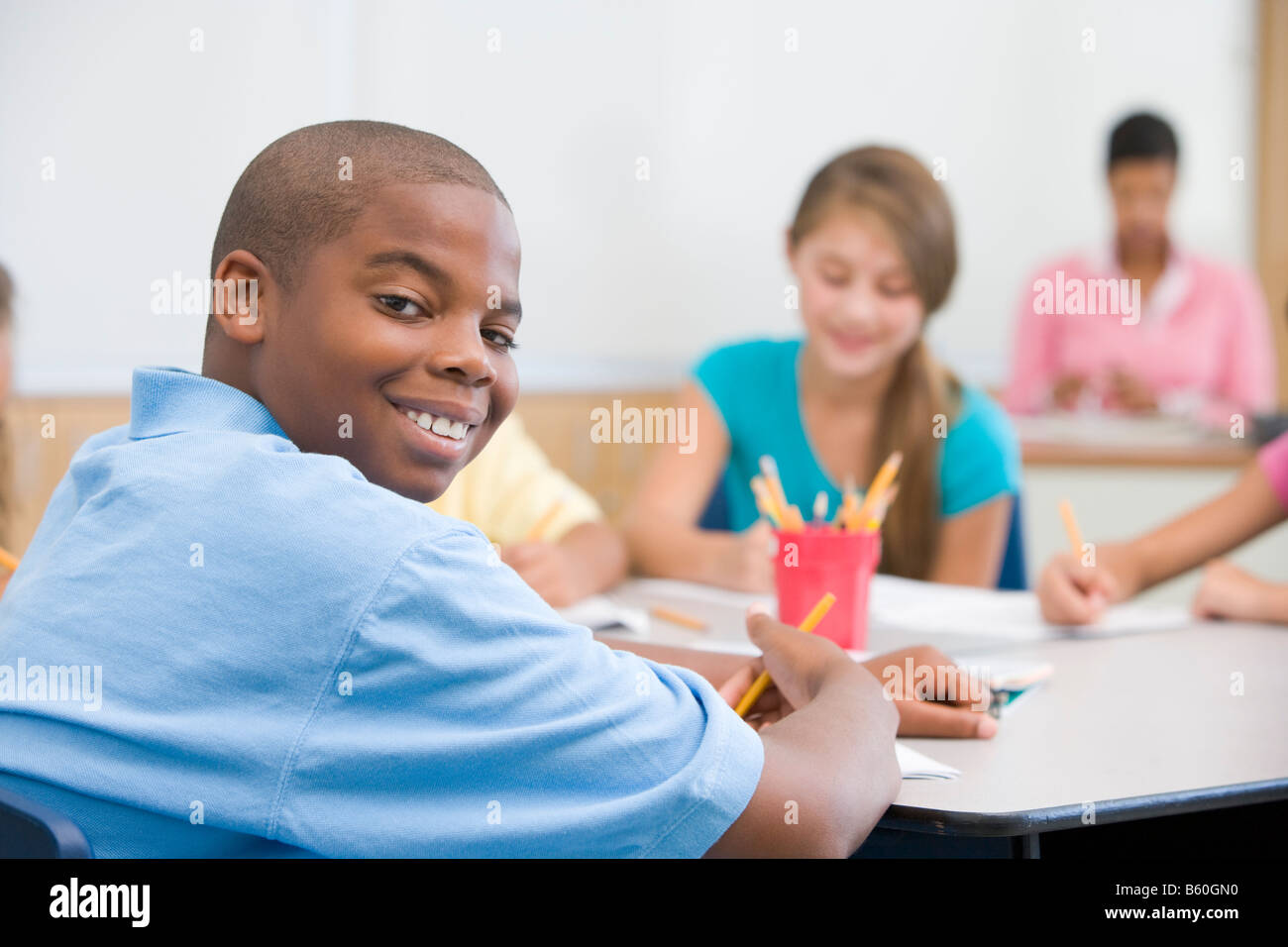African american teen boy writing hi-res stock photography and images ...