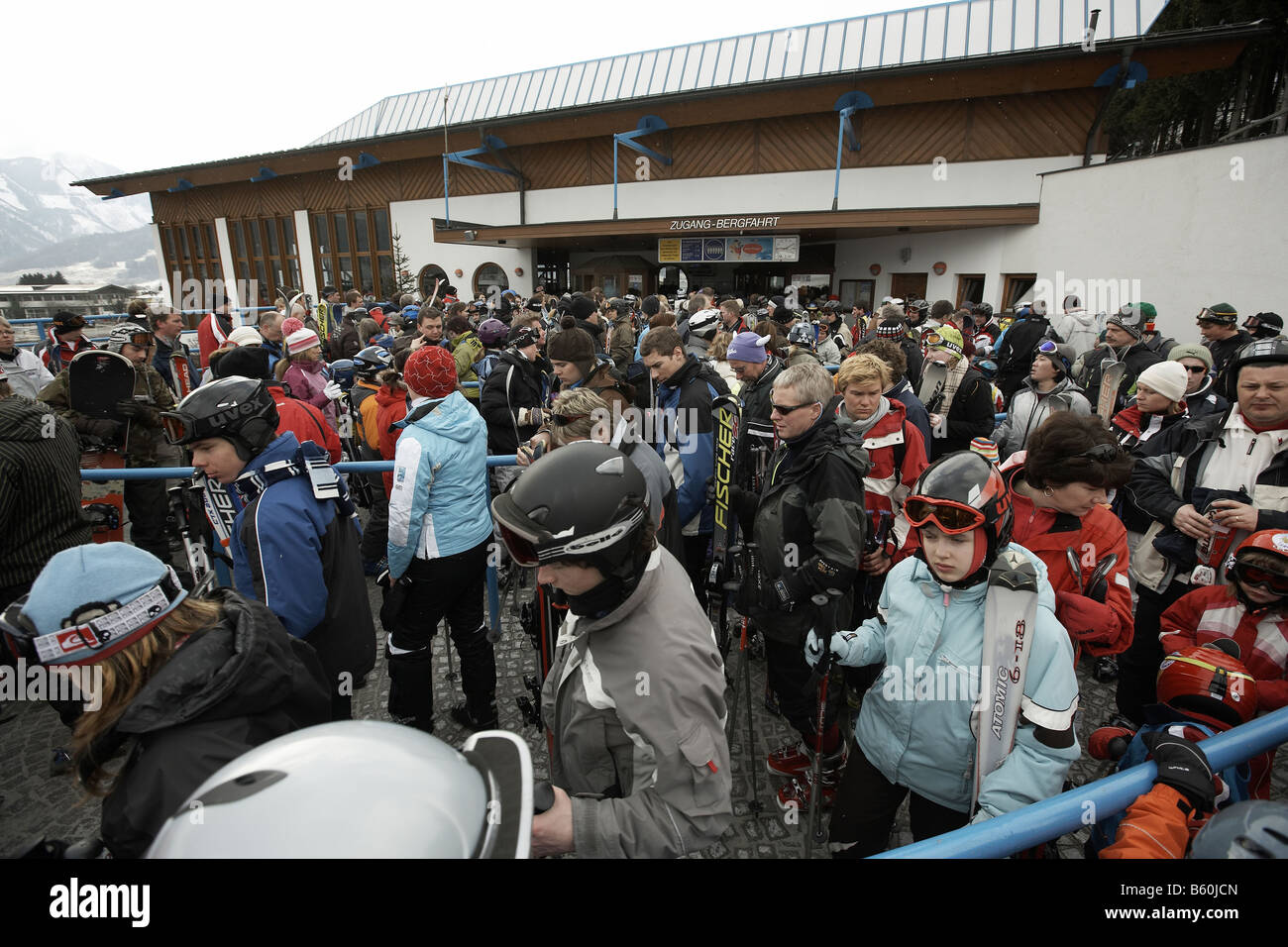 Skiers queuing for lift austria Stock Photo