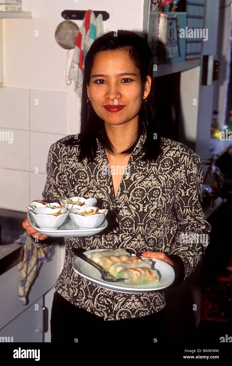 Vietnamese woman, adult woman, cook, cooking, chef, waitress, Vietnamese restaurant, Brussels, Brussels Capital Region, Belgium, Europe Stock Photo