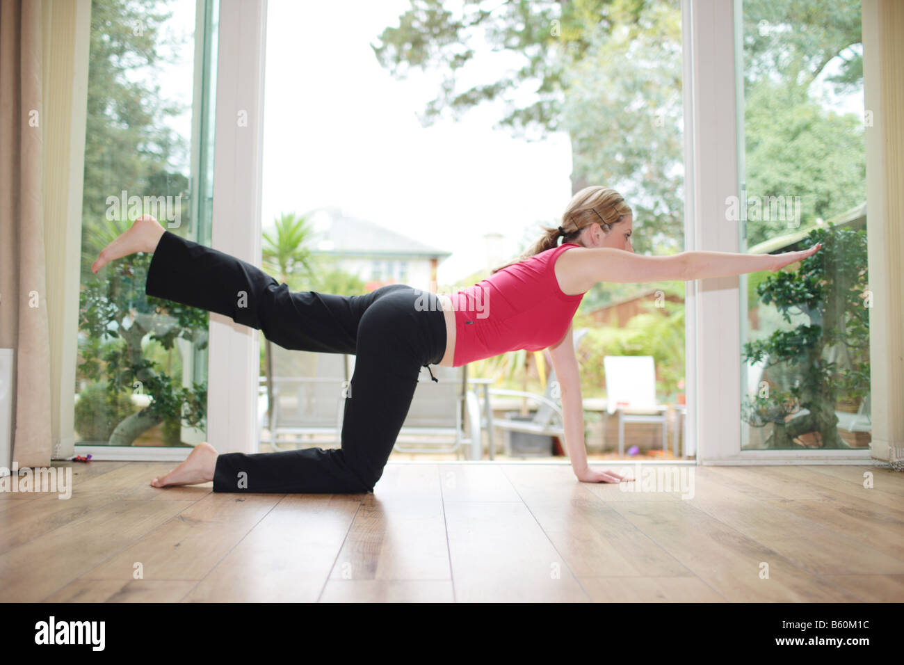 Young Woman Doing Kneeling Ab Crunch Model Released Stock Photo Alamy