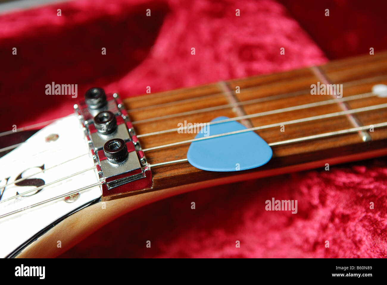 Guitar And Plectrum Stock Photo Alamy
