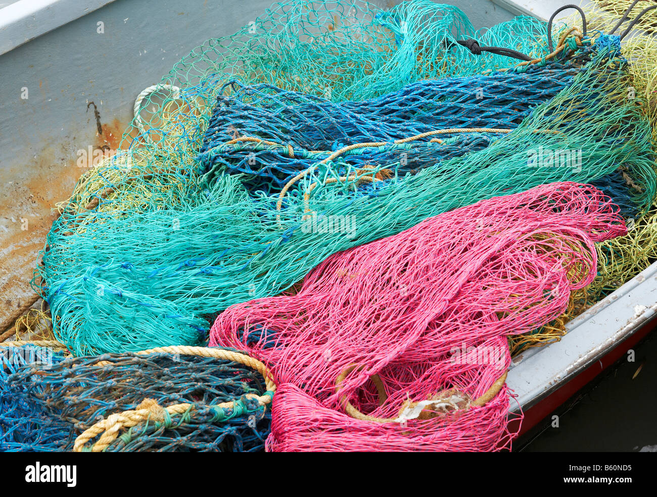 Colourful fishing nets on a boat Stock Photo Alamy