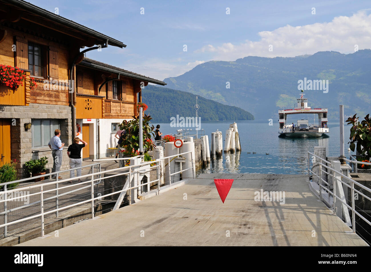 Landing stage, car-ferry on its way from Beckenried to Gersau, Vierwaldstaettersee or Lake Lucerne, Canton of Lucerne Stock Photo