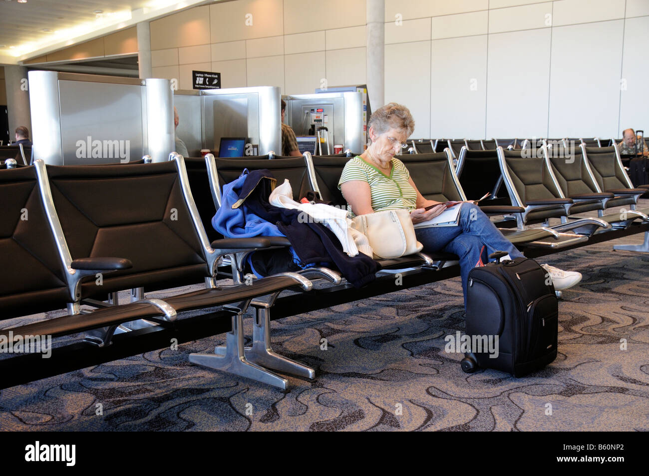 Airport lounge passenger seating rows at Tampa International Florida America USA Stock Photo