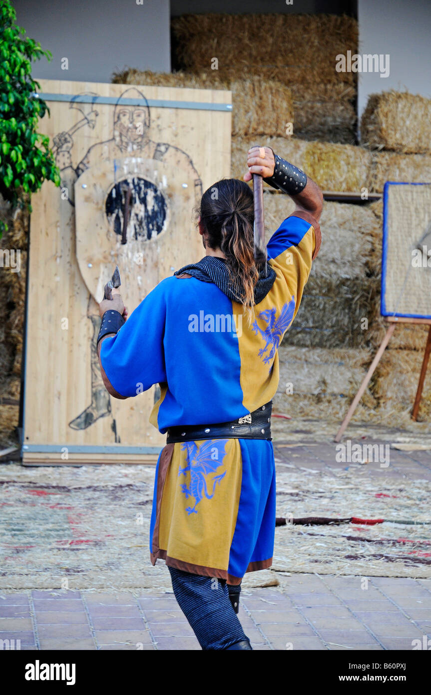 Axe throwing, target, man, costume, clothing, tradition, display