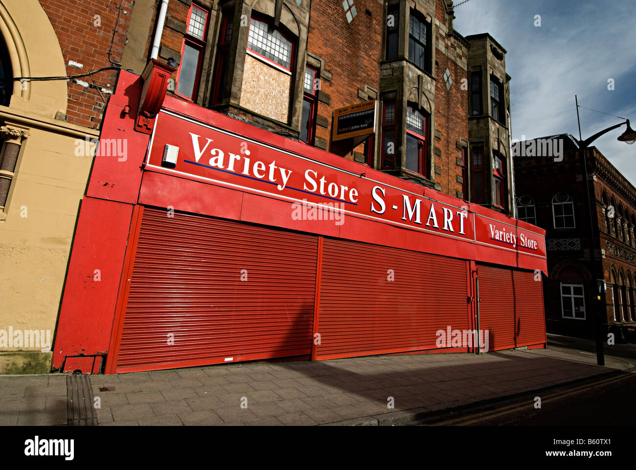 burslem small super market with red shutter the variety store smart small shop Stock Photo Alamy