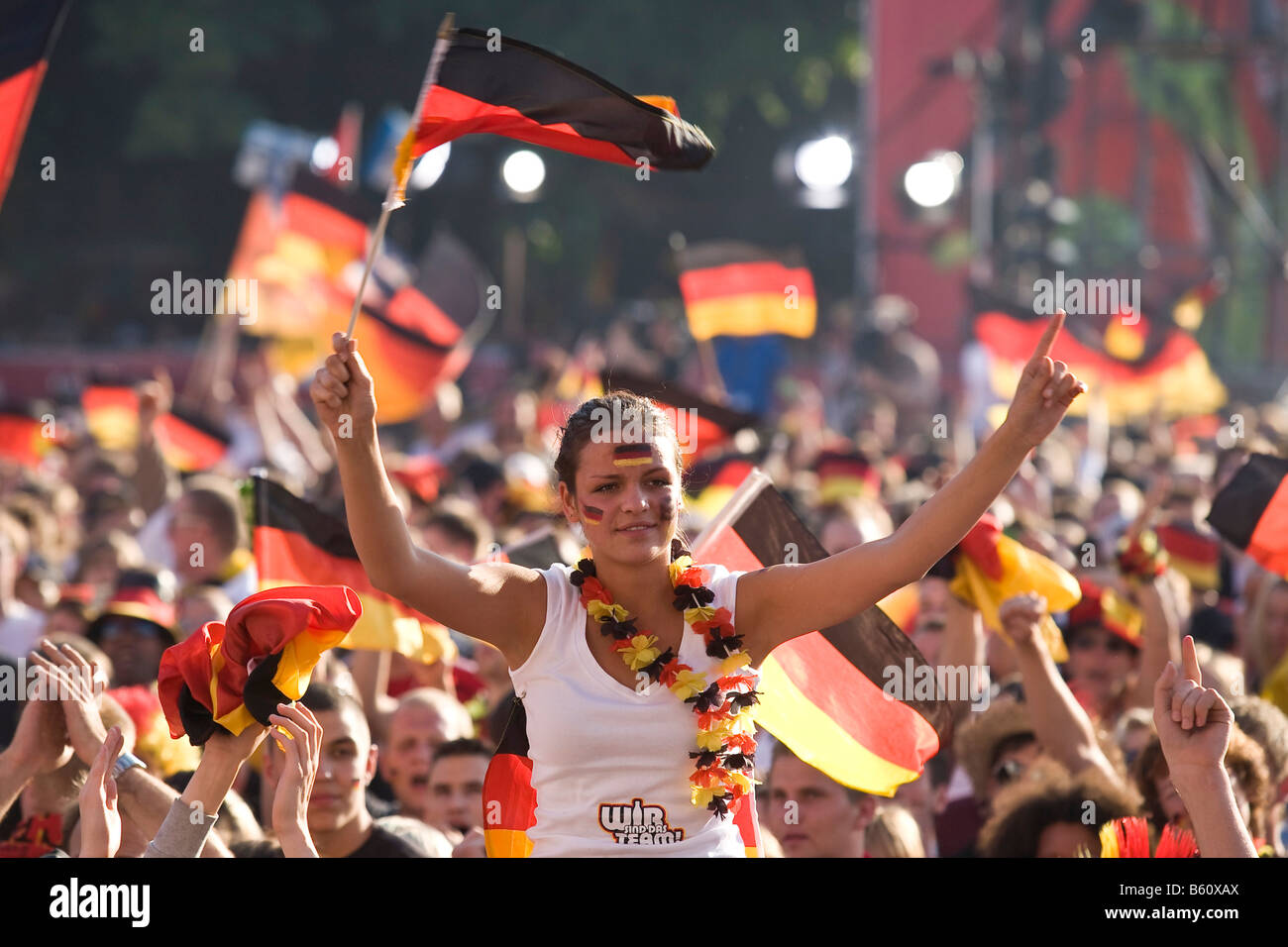 Fans with German flags watching the final game of the football EM on the Berlin fan mile, Berlin Stock Photo