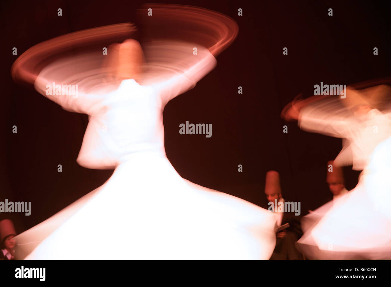 The whirling dervishes perform in Istanbul, Turkey Stock Photo