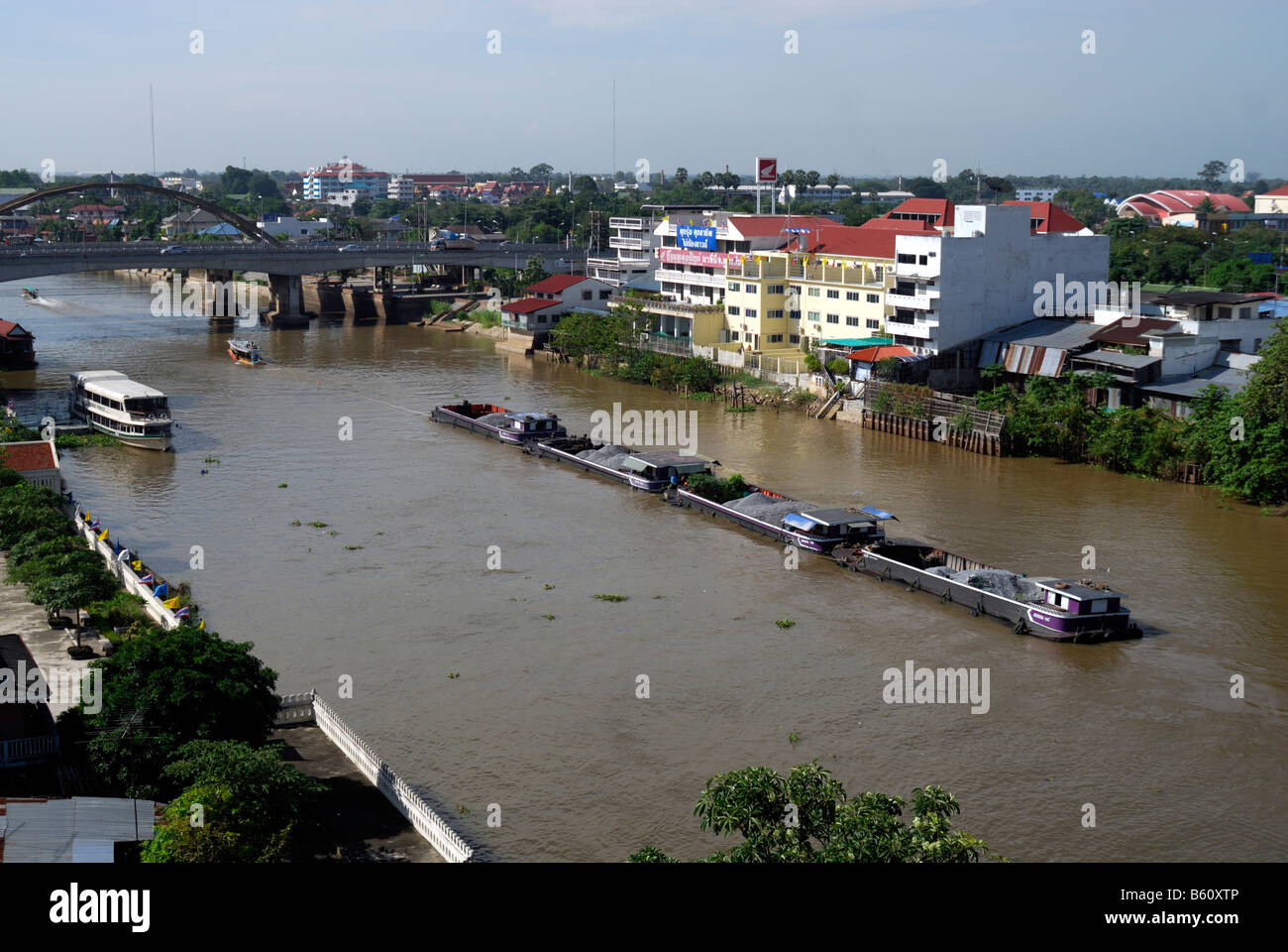 Barges en route to Bangkok from Ayuthaya,Thailand,Chao Phraya river. Stock Photo