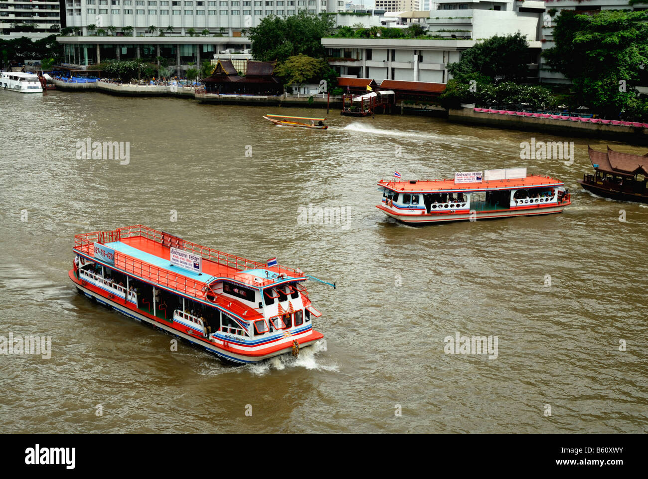 Public ferries crossing Chao Phraya river,Bangkok,Thailand Stock Photo