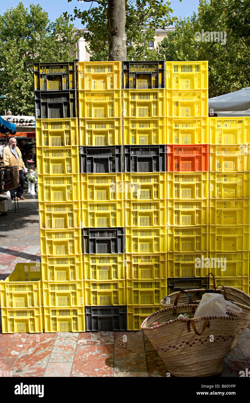 plastic crates stacked with produce at market in carcassonne Stock