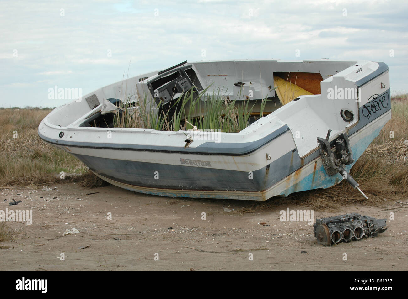 boat abandoned on shore Stock Photo
