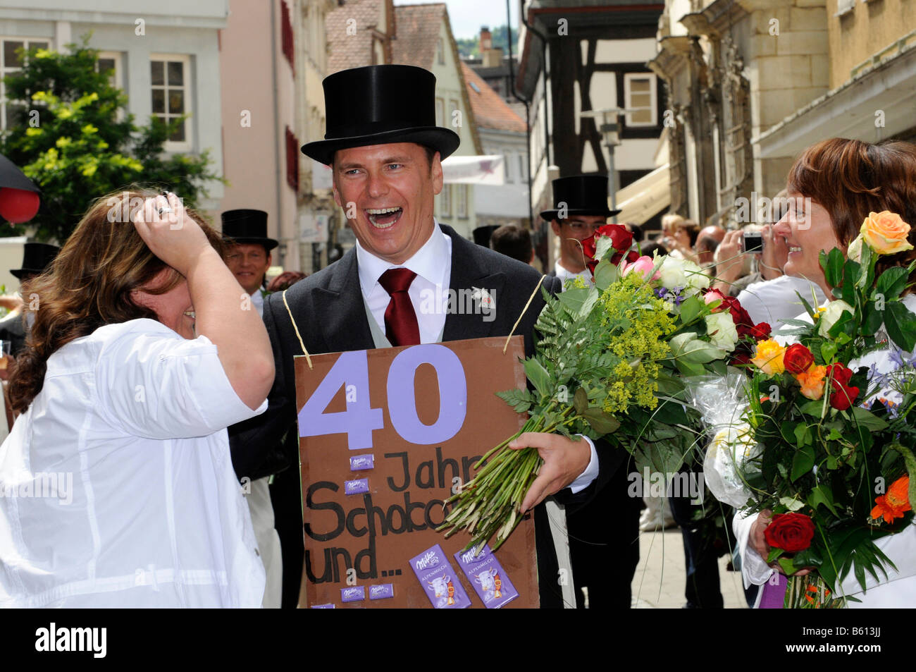 Man wearing a top hat, Gmuender city festival, parade of the 40-year-old people, Schwaebisch Gmuend, Baden-Wuerttemberg Stock Photo