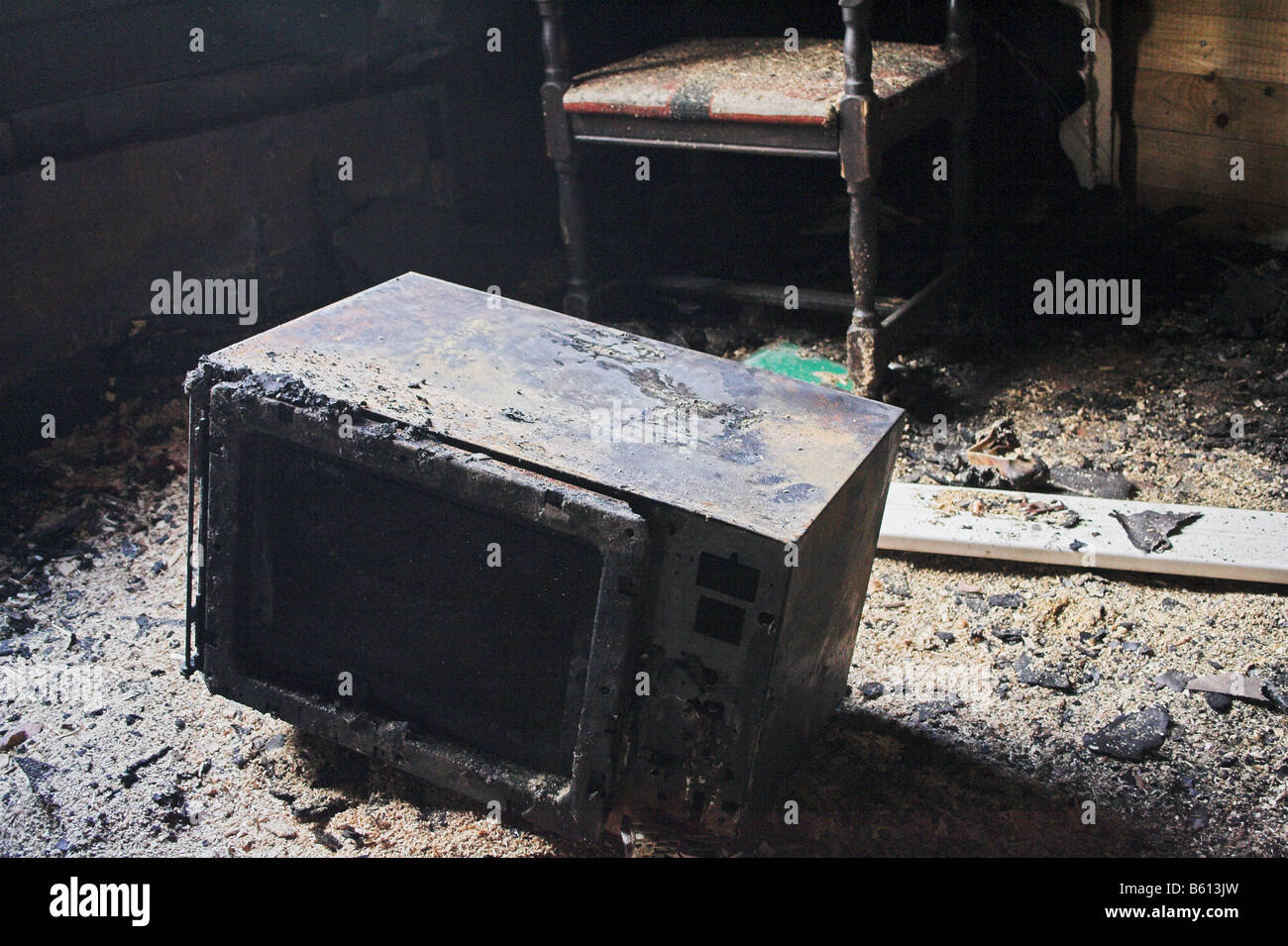 Microwave oven in burned house Stock Photo Alamy