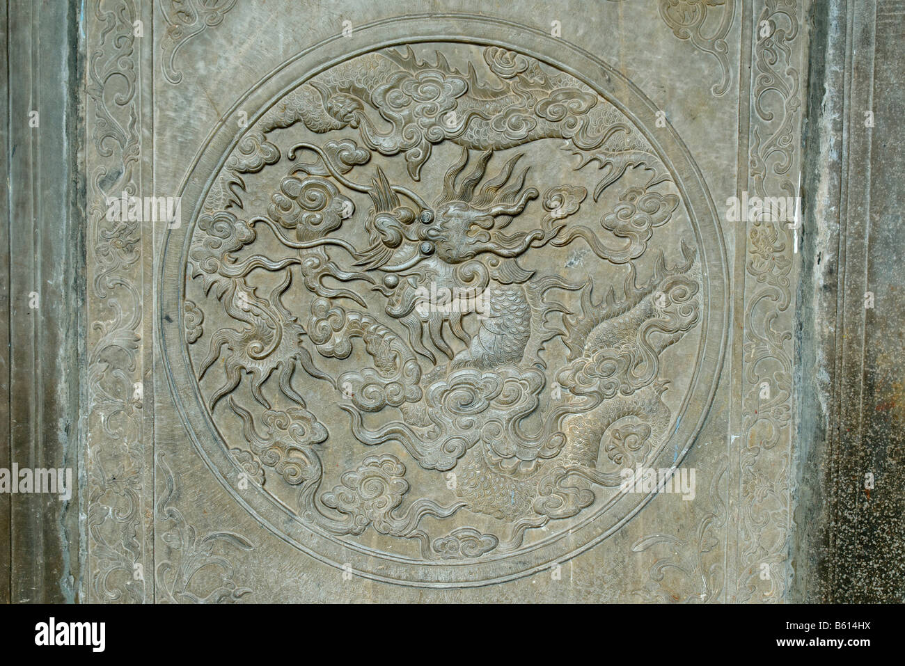 Stone carving of a Chinese dragon in a temple, Hoi An, UNESCO World Heritage Site, Vietnam, Asia Stock Photo