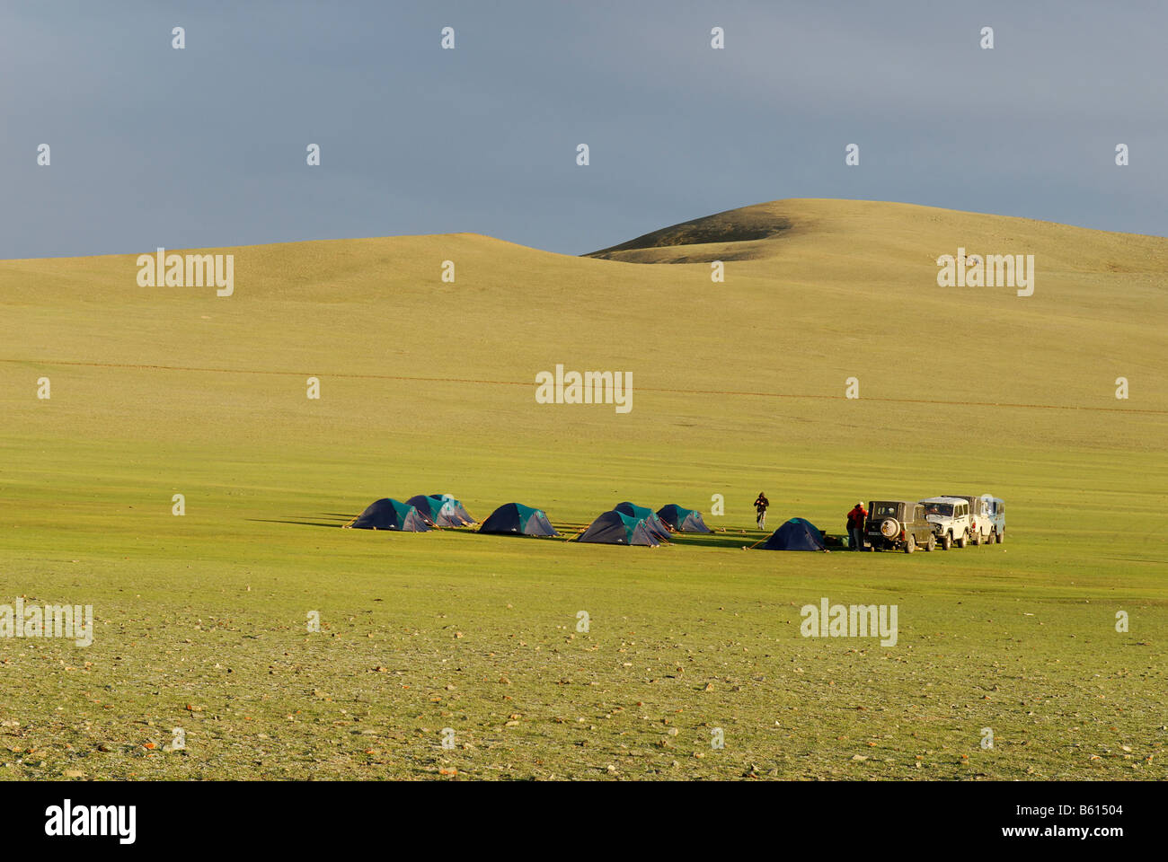 Tourist camp with tents and jeeps, Altai, Mongolia, Asia Stock Photo