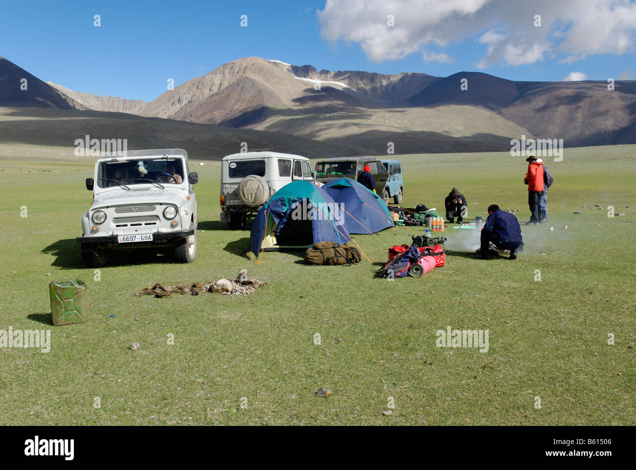 Tourist camp with tents and jeeps, Altai, Mongolia, Asia Stock Photo