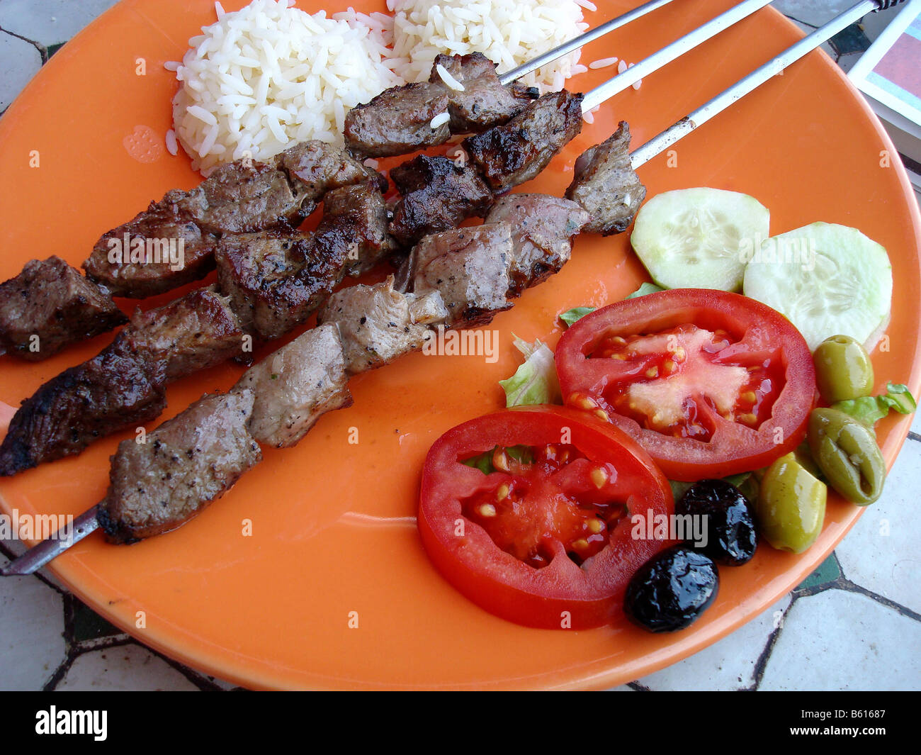 Lamb kebabs, Moroccan speciality, in a restaurant on Djemma el-Fna Square, 'Imposter's Square' or 'Square of the Hanged' Stock Photo