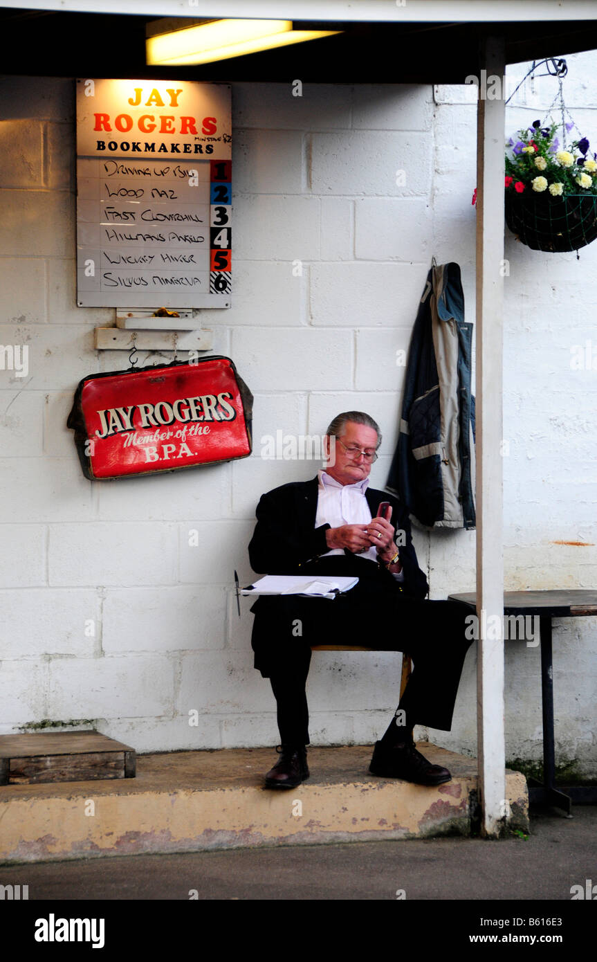 Bookmaker at Henlow racetrack during greyhound racing, Henlow, Bedfordshire, England, United Kingdom, Europe Stock Photo