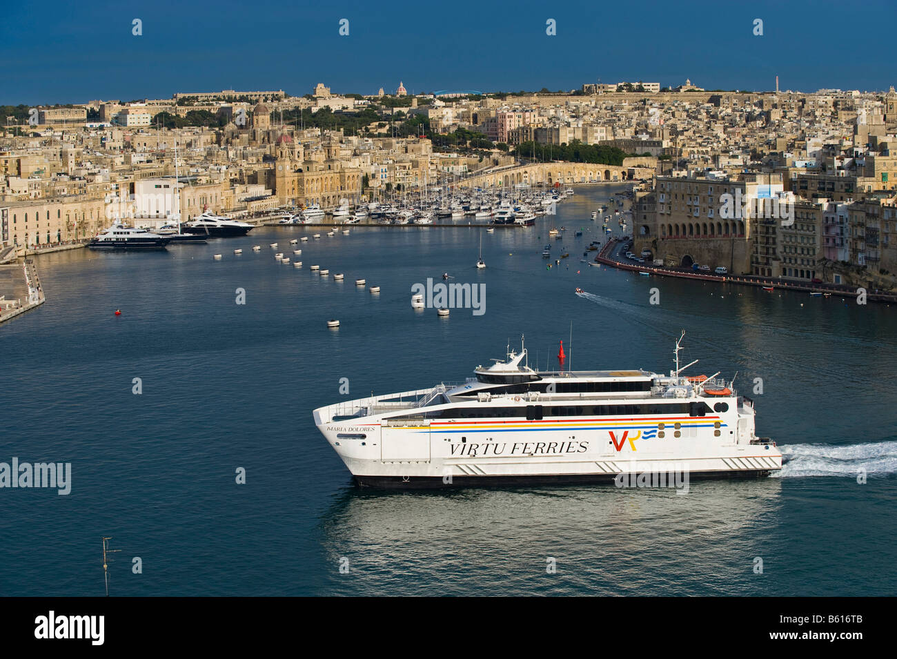 The Three Cities, Vittoriosa with Fort San Angelo and a ferry from Sicily, from La Valletta with Grand Harbour, Malta, Europe Stock Photo