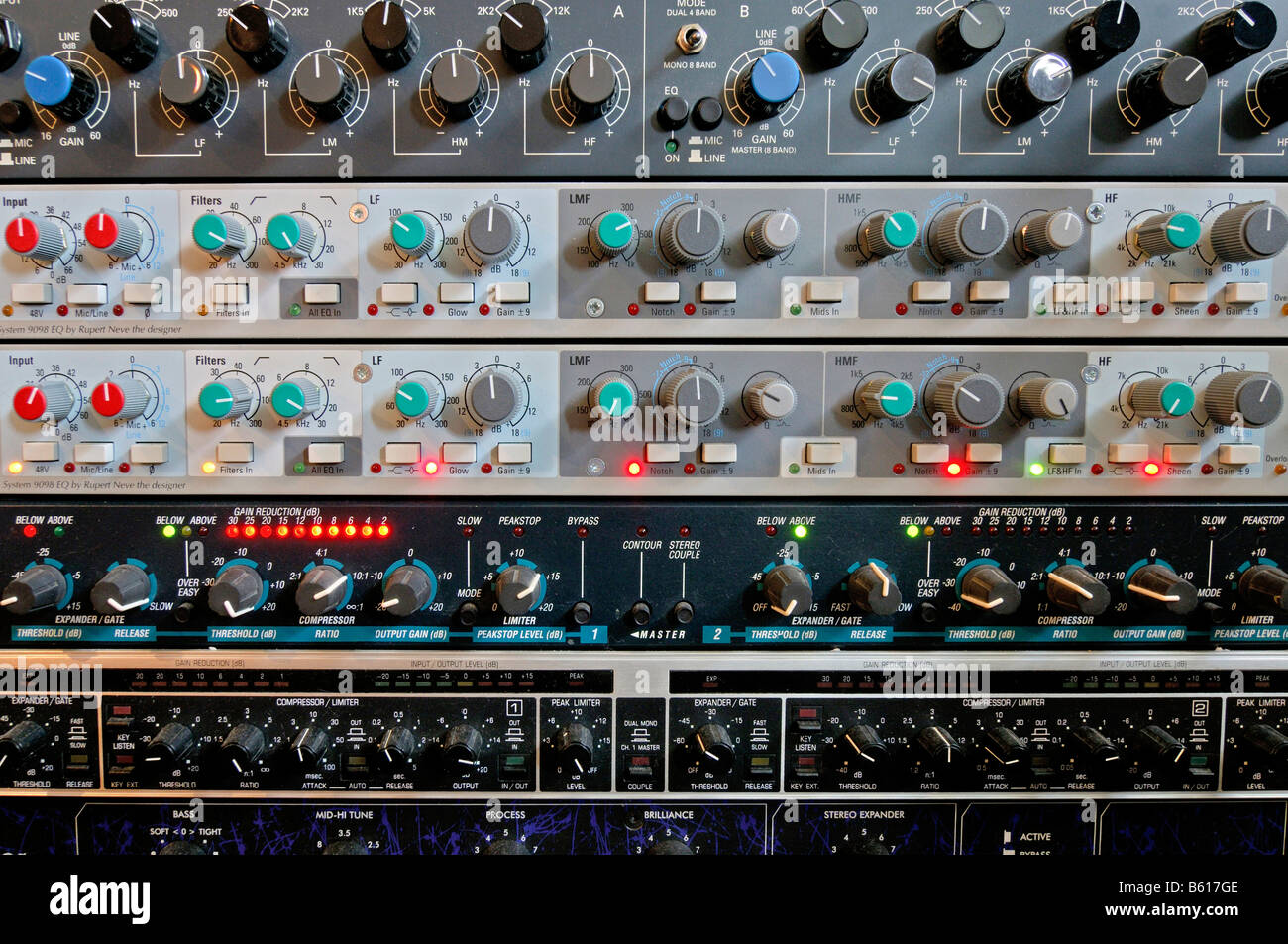 Different buttons and controllers on a mixer and amplifier in a sound studio Stock Photo