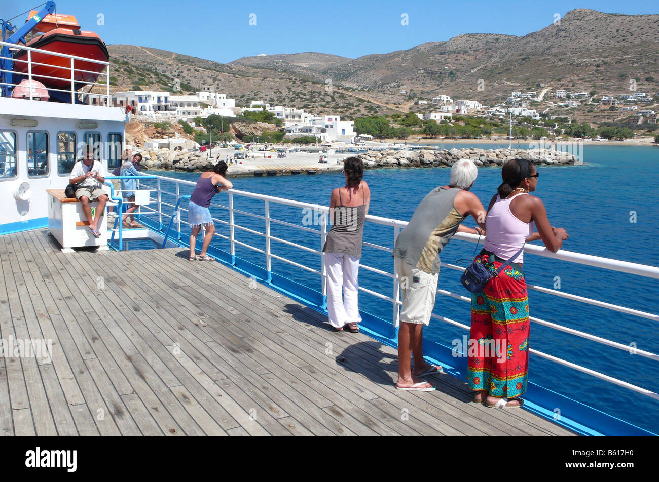 Passengers on the deck of a car ferry, Port of Folegandros, Cyclades, Greece, Europe Stock Photo