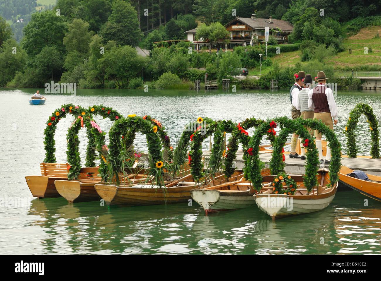 Decorated church boats before the beginning of the Alt-Schliersee churchday, Lake Schliersee, Upper Bavaria Stock Photo