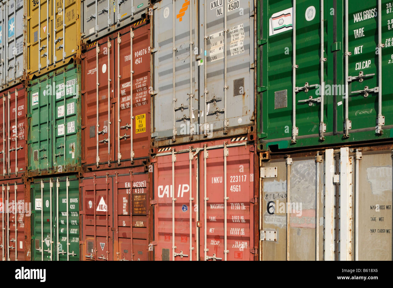 Sloping view of stacked overseas containers, format-filling Stock Photo