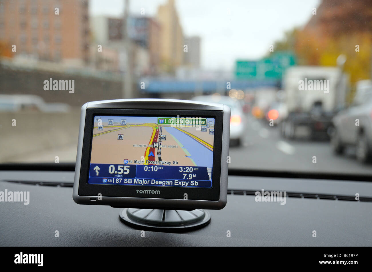 Tomtom mounted on car dashboard Major Deegan Expressway New York Stock Photo