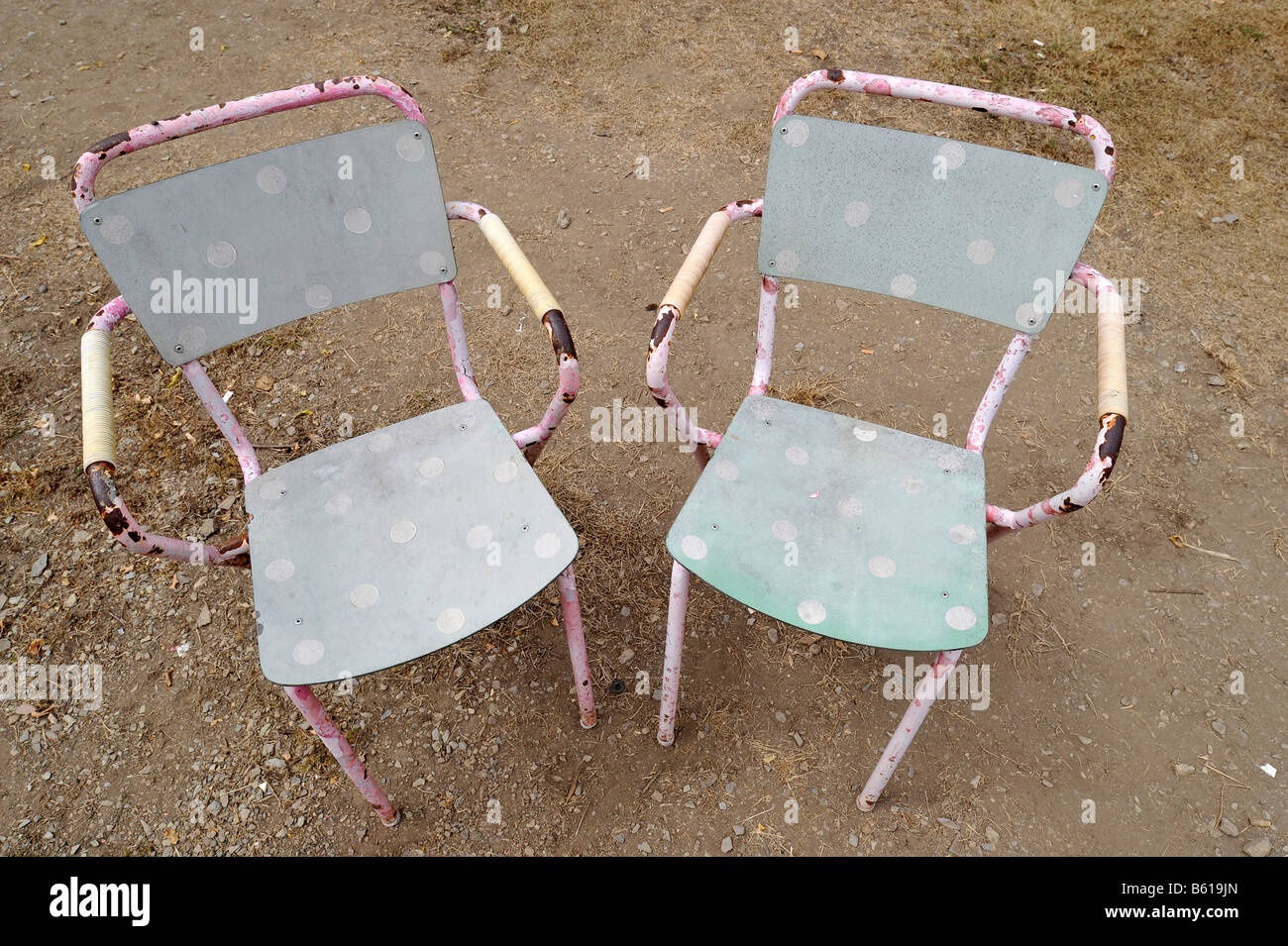 Two unused old chairs Stock Photo