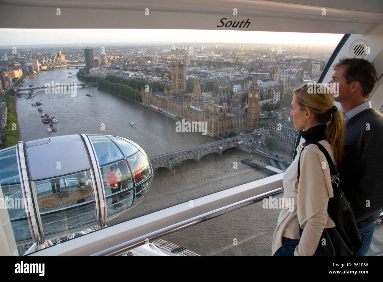 Tourists view the city of London from the London Eye England Stock Photo