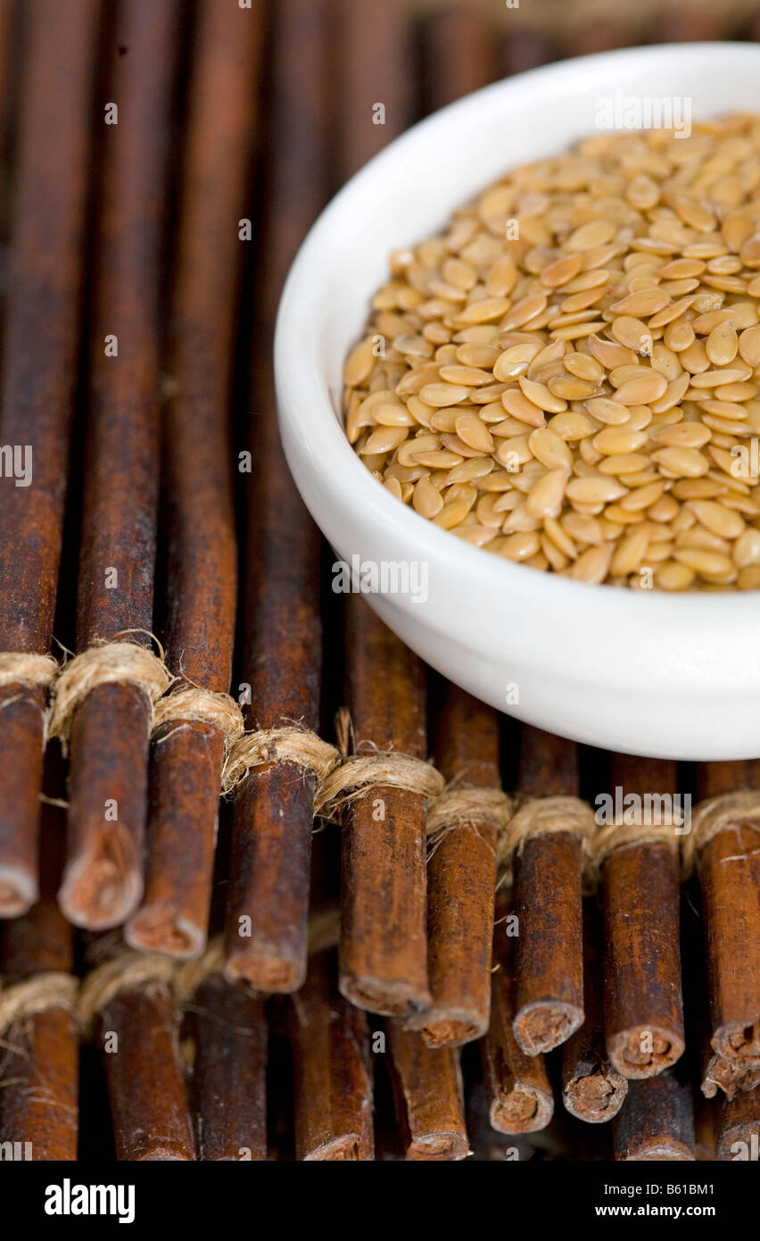 Flax seed in bowl Stock Photo