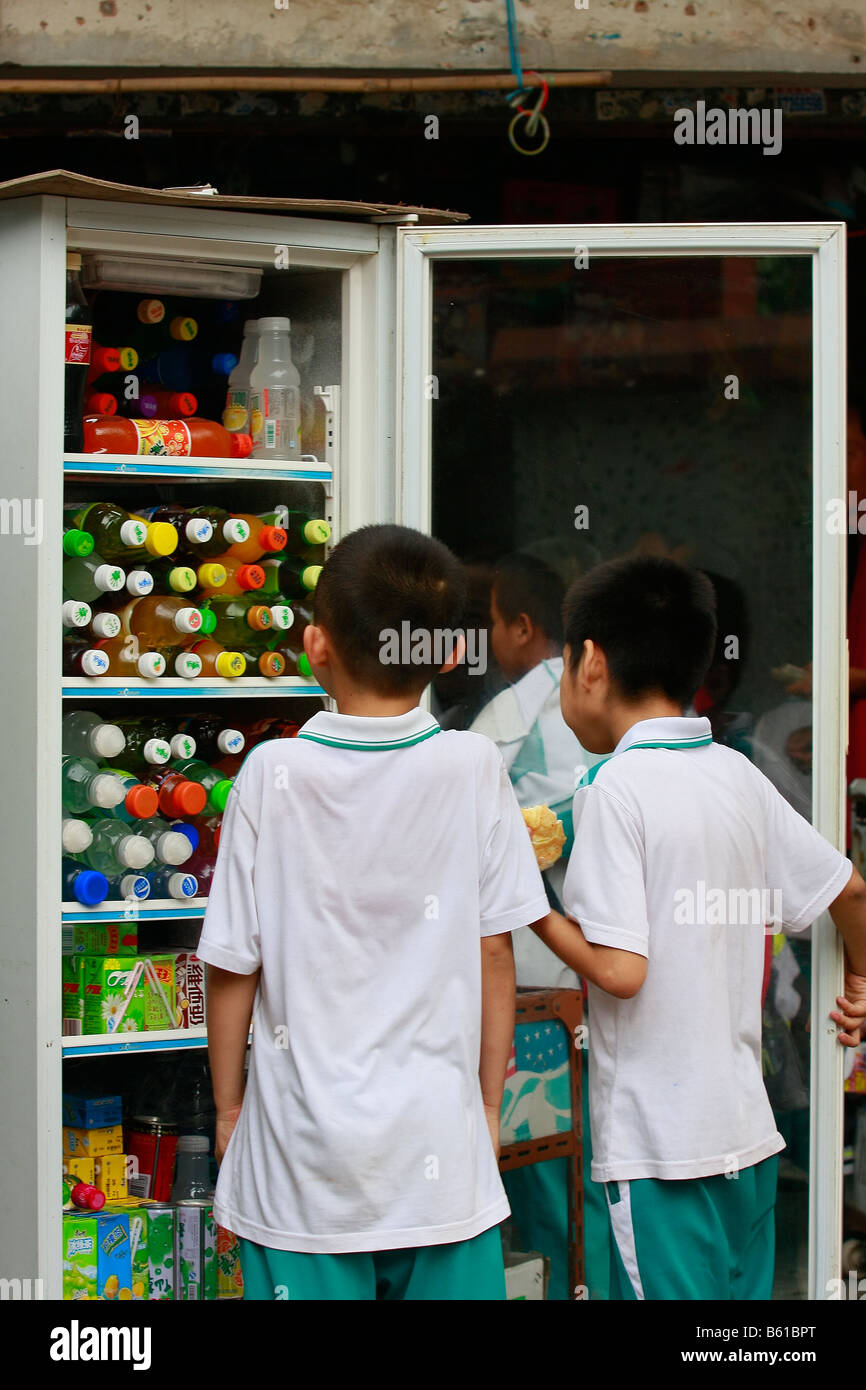 Chinese students looking for after school drink during the milk scare crises Stock Photo