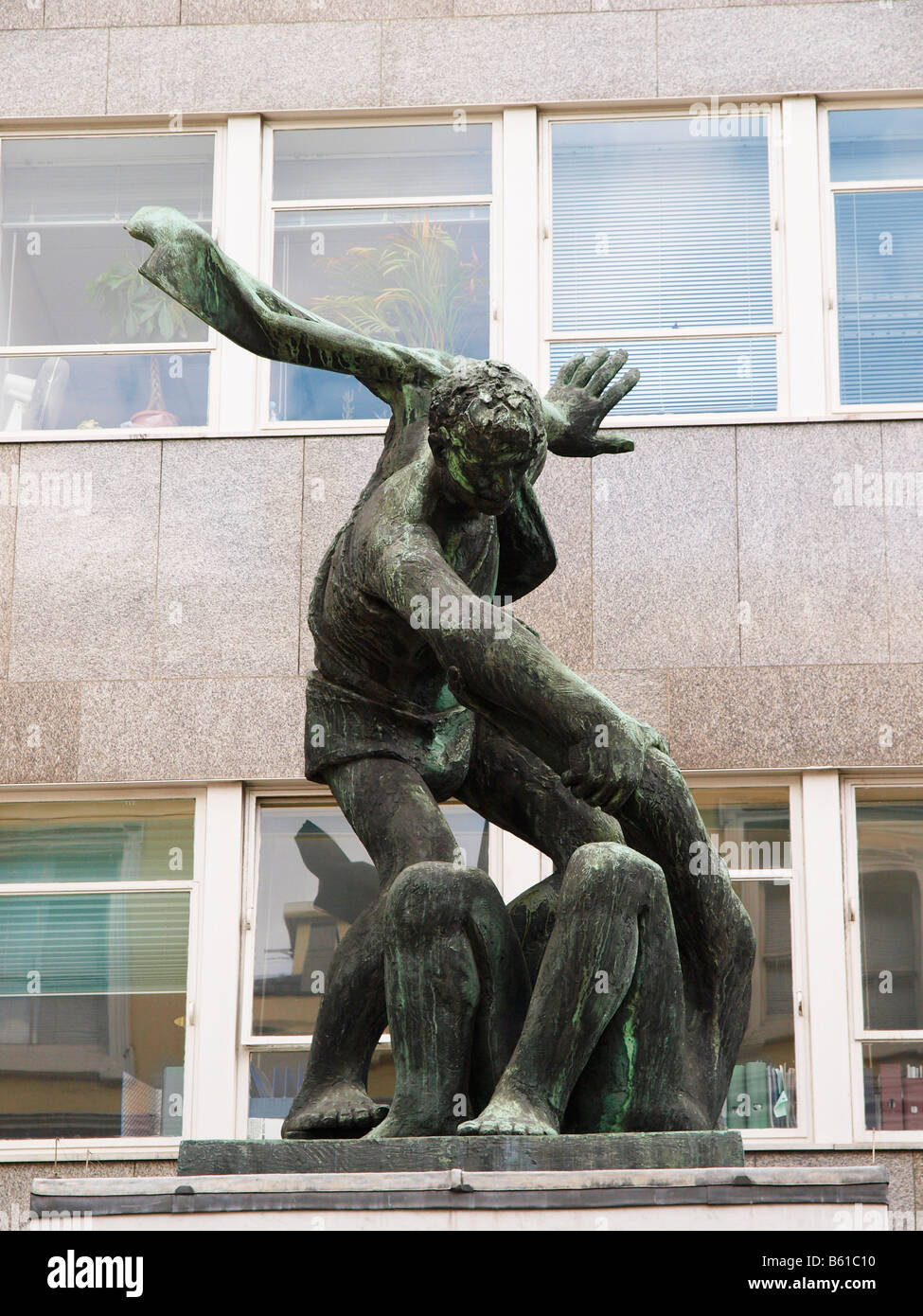 Trades Union headquarters building with bronze sculpture by Bernard Meadows representing the spirit of trade unionism. Stock Photo