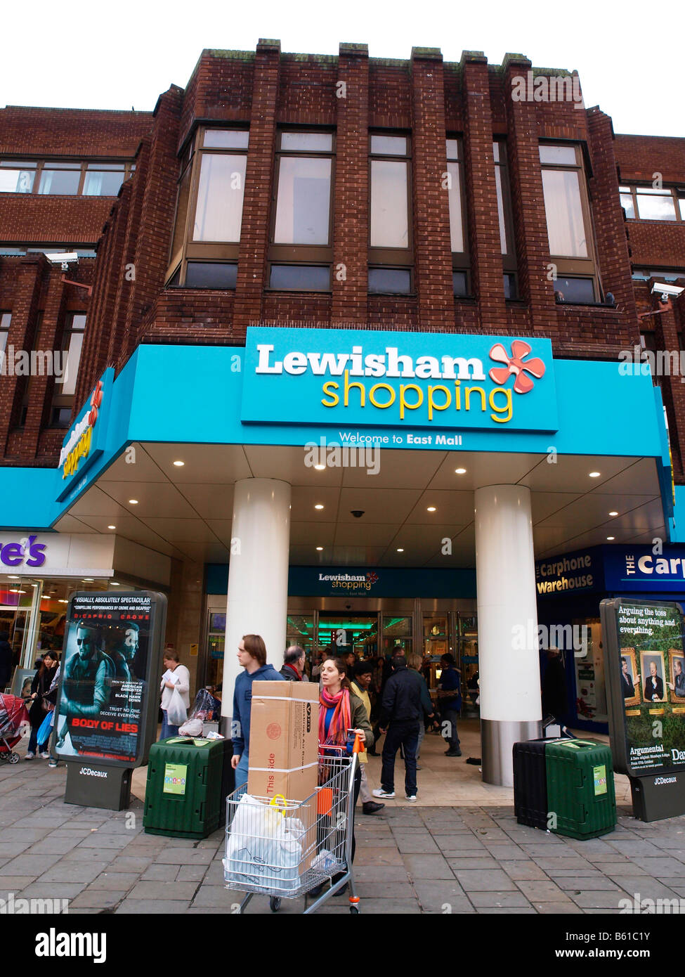 Christmas Shoppers leaving Lewisham Shopping Centre, formerly Riverdale Centre, Lewisham London England Stock Photo