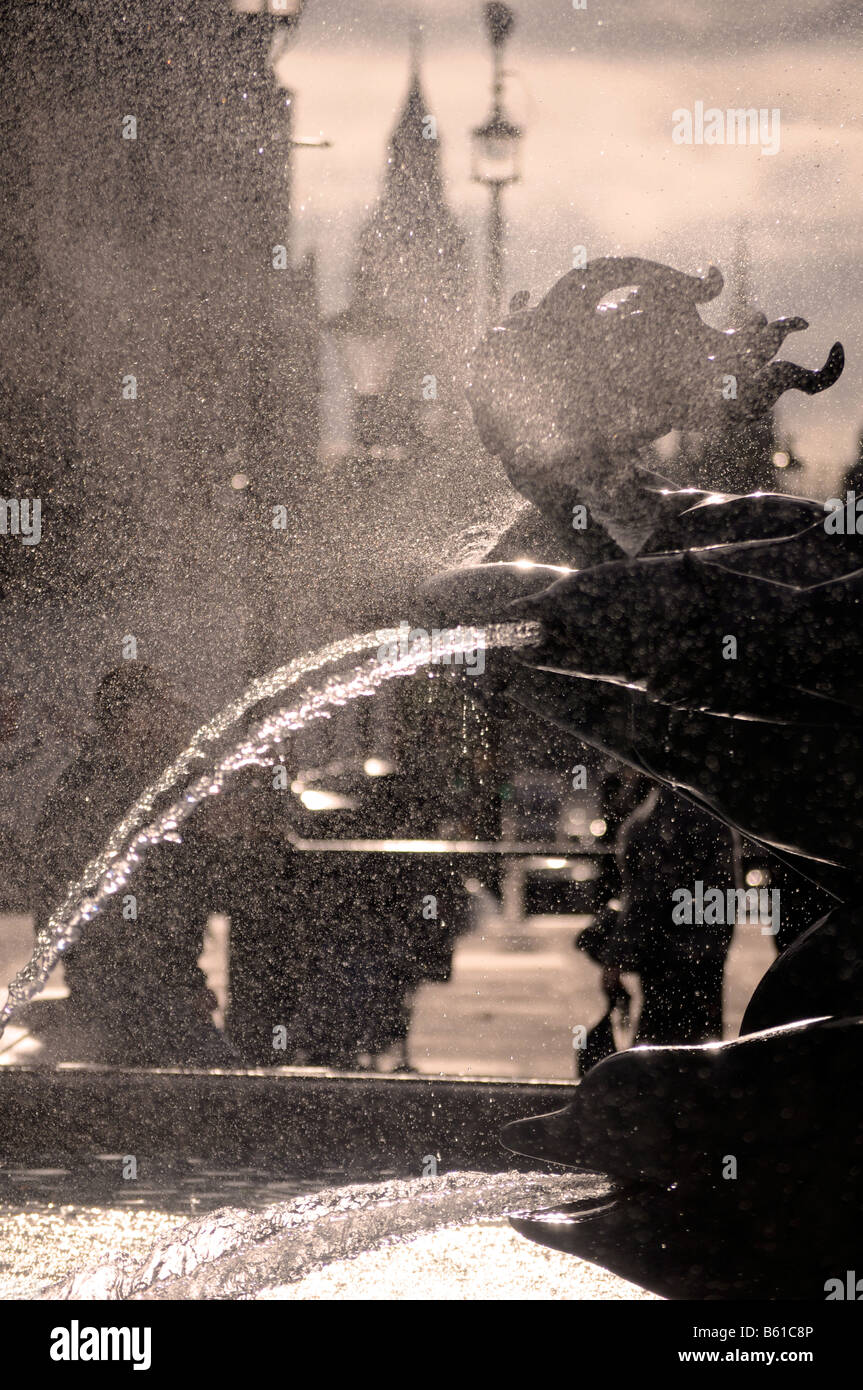 Royalty free photograph of atmospheric fountains in Trafalgar Square London UK Stock Photo