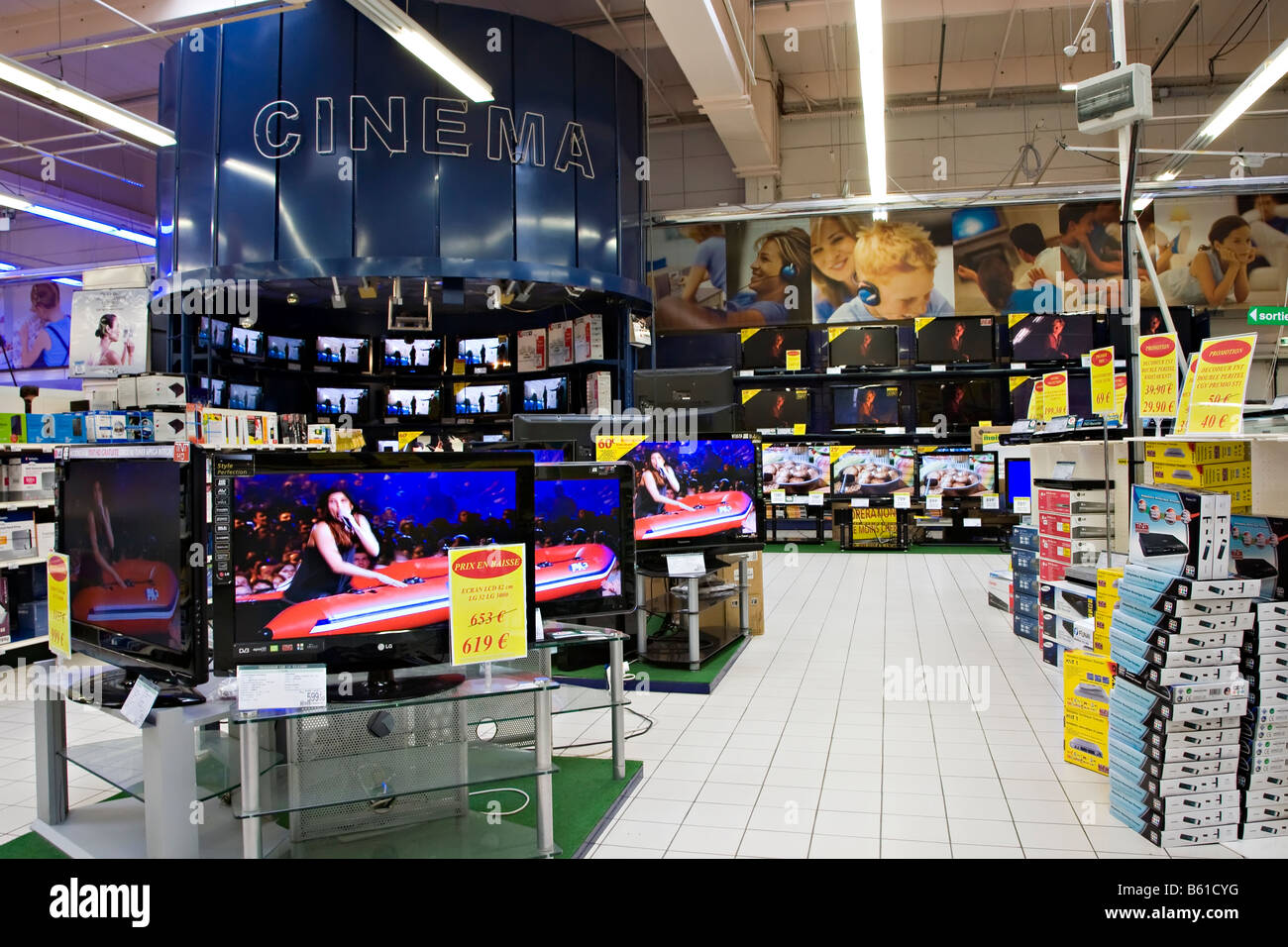 Televisions and electrical goods on display in supermarket France Stock Photo