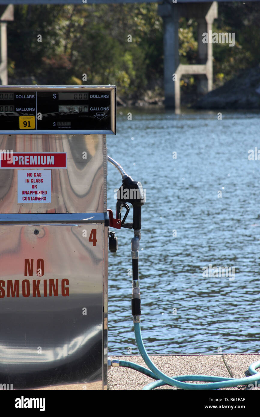 A gas pump on the pier of the White River Branson Missouri Stock Photo