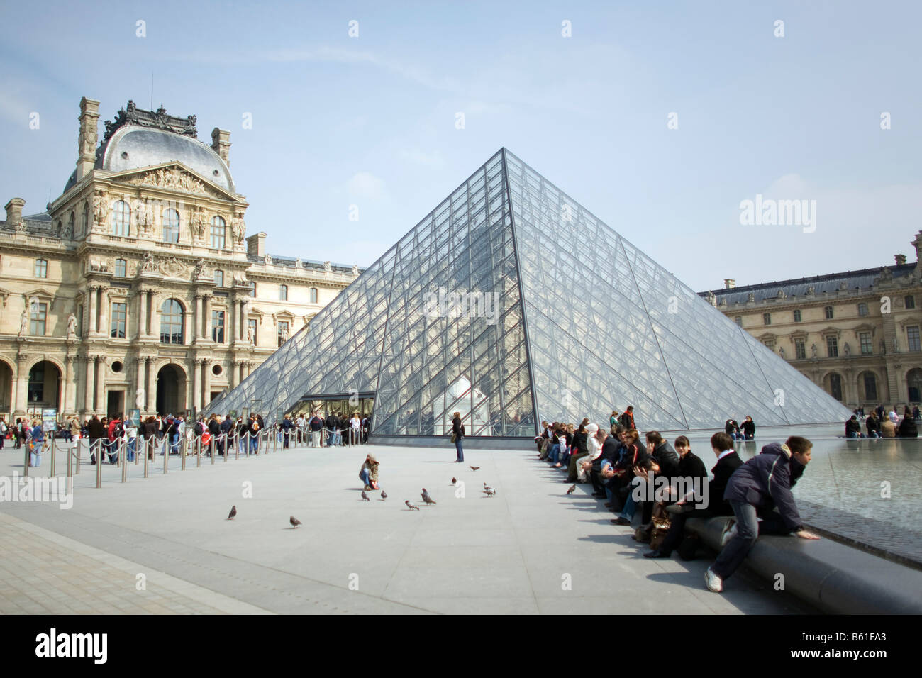 A view of the glass pyramid, designed by architect I.M. Pei, marking an entrance to the Musee du Louvre in Paris Stock Photo