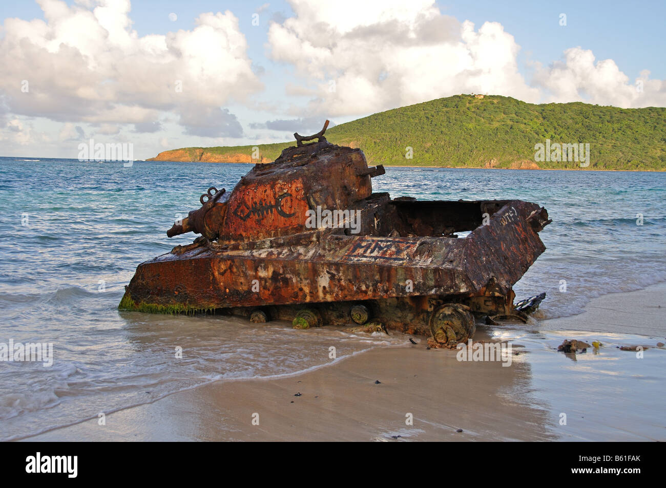 an old rusted out tank sits on flamenco beach on isla culebra puerto rico Stock Photo
