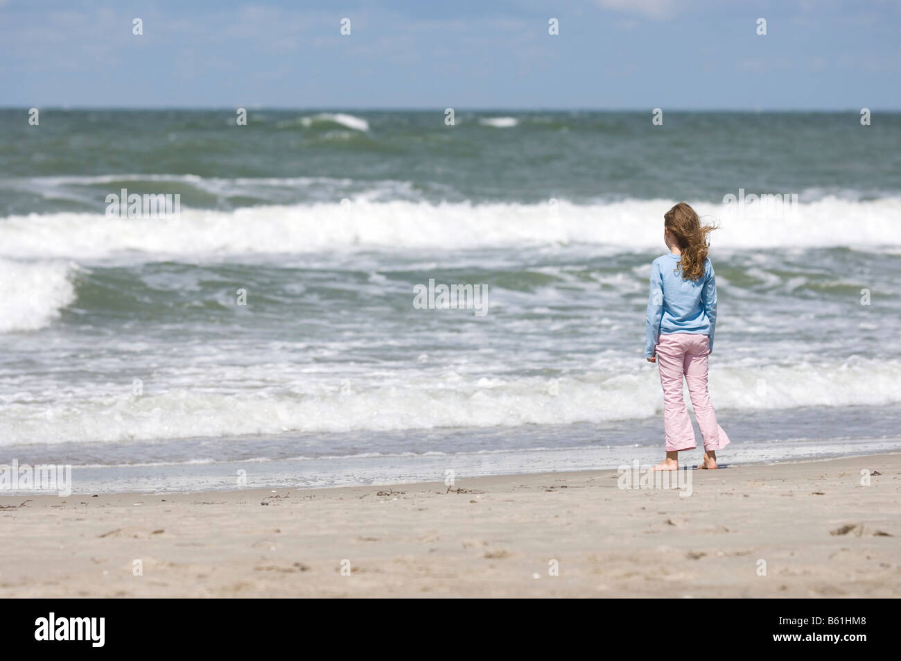Girl alone on the beach, Graal Mueritz, Mecklenburg-Western Pomerania Stock Photo